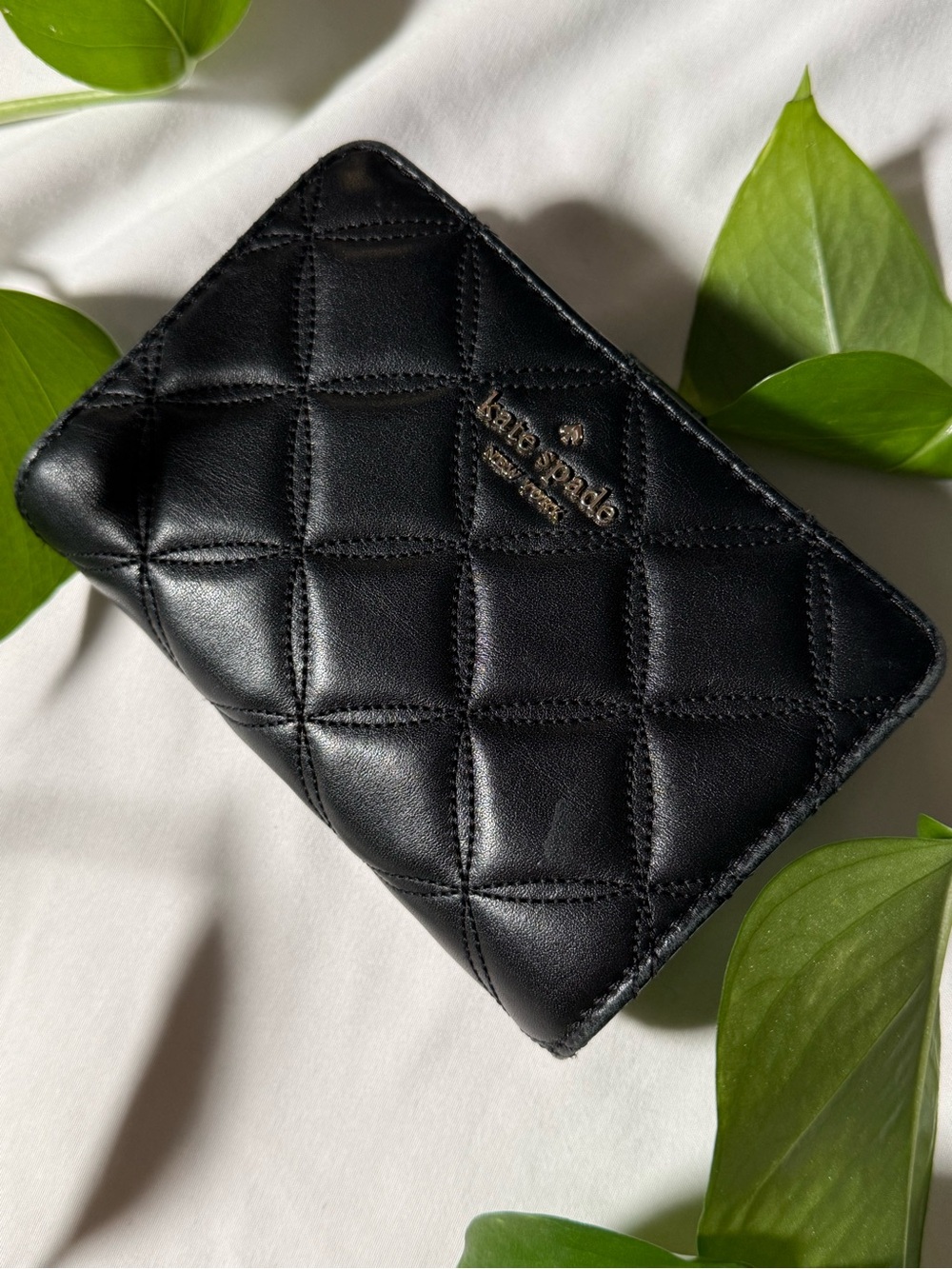 Kate Spade New York Quilted Black Wallet with Gold Logo Detail